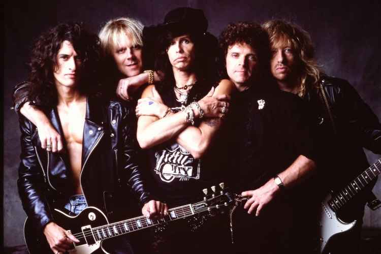 Imagem de 1988 da banda Aerosmith. Na época, os músicos estavam divulgando o álbum Pump(foto: Norman Seeff/Facebook/aerosmith/Reprodução) Imagem de 1988 da banda Aerosmith. Na época, os músicos estavam divulgando o álbum Pump(foto: Norman Seeff/Facebook/aerosmith/Reprodução)